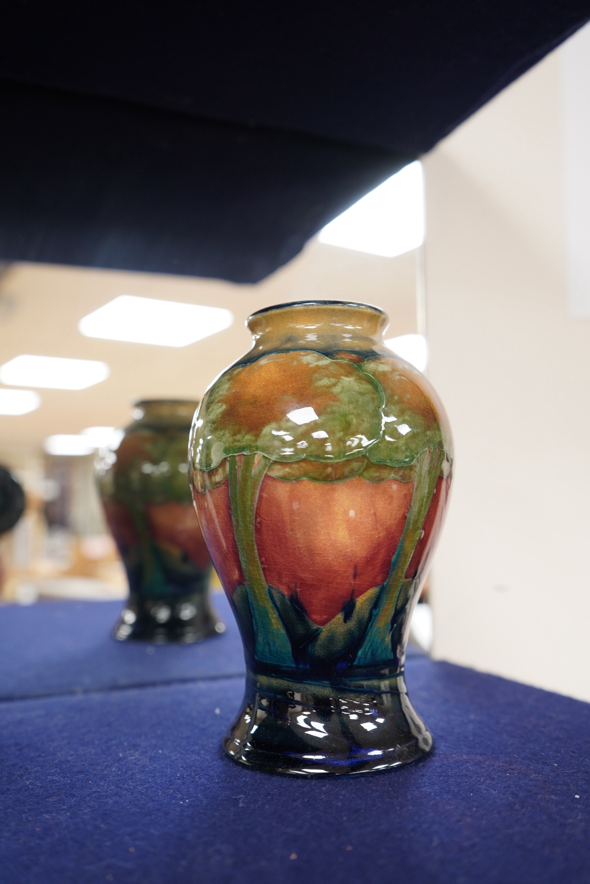 A Moorcroft Eventide pattern vase, 16cm high. Condition - good